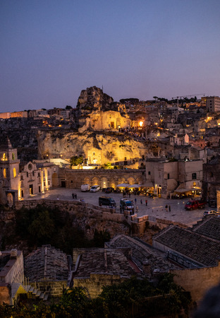 Matera; Italy - September 17; 2019: Bond 25. Scene of a procession with extras carrying candles. from the movie "No Time to Die" in Sassi; Matera; Italy.のeditorial素材