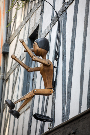 Troyes, France - August 31, 2018: Pinocchio hung on the wall of the house in Troyes. Aube, Champagne-Ardenne, Franceのeditorial素材