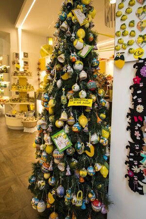 Sorrento, Italy - June 12, 2017: A Christmas tree decorated with lemons, the symbol of Sorrento....