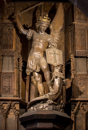 Le Mont-Saint-Michel, France - September 13, 2018:  Statue of Saint Michel killing the dragoon in Saint Pierre parish church. Mont Saint Michel, Franceのeditorial素材