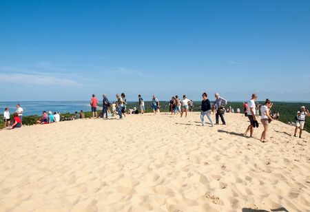 Dune of Pilat, France - September 10,2018: People on the Dune of Pilat, the tallest sand dune in Europe. La Teste-de-Buch, Arcachon Bay, Aquitaine, Franceのeditorial素材