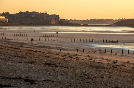 Saint-Malo, France - September 16, 2018:The evening light on beach and olt town of Saint Malo , France, Ille et Vilaine, Brittany, France,のeditorial素材