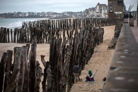 Saint-Malo, France - September 12, 2018: Big breakwater, 3000 trunks to defend the city from the tides, Plage de l'Ãventail beach in Saint-Malo, Ille-et-Vilaine, Brittany,のeditorial素材