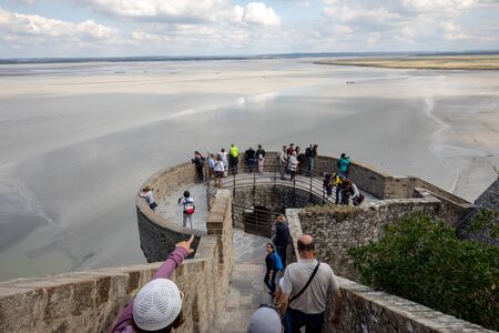 Le Mont-Saint-Michel, France - September 13, 2018: Crowd of tourists at Mont Saint-Michel, the...