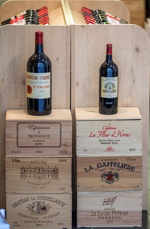 Saint Emilion, France - September 8, 2018: Interior of a wine shop in Saint Emilion in France. St Emilion is one of the principal red wine areas of Bordeaux and very popular tourist destination.のeditorial素材