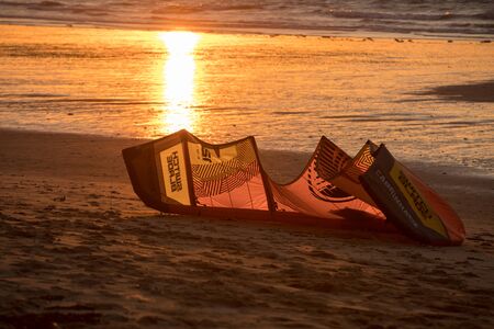 Saint-Malo, France - September 13, 2018: Sunset and Kitesurfers on the beach in Saint Malo,  Brittany, Franceのeditorial素材