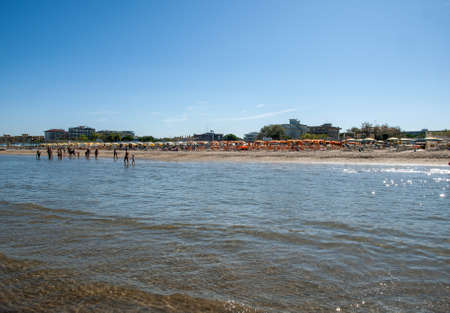 Cesenatico, Emilia Romagna, Italy - Sept 13 2019: People are resting on a sunny day at the beach in...