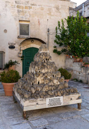 Matera, Italy - September 15, 2019: Closeup model of the Sassi di Matera - meaning stones of Matera which are prehistoric cave dwellings in the Italian city of Matera, Basilicata. It is one of the first or eldest settlements of Italy.のeditorial素材