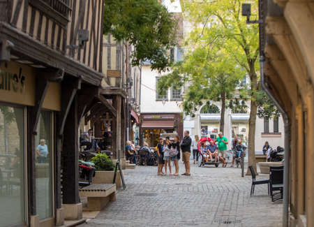 Troyes, France - August 31, 2018: Tourists exploring the narrow streets of medieval Troyes old town,  Aube, Champagne-Ardenne, Franceのeditorial素材
