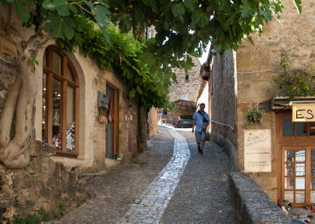 Beynac et Cazenac, France - September 4, 2018: Typical French townscape with ancient housest and cobblestone street in the traditional town Beynac-et-Cazenac, Franceのeditorial素材