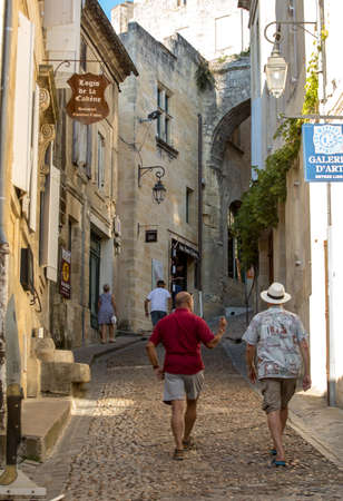 St Emilion, France - September 11, 2018: Tourists in the cobbled streets of Saint Emilion. France. St Emilion is one of the principal red wine areas of Bordeaux and very popular tourist destinationのeditorial素材