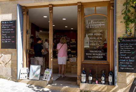 Saint Emilion, France - September 8, 2018: Exterior of a wine shop in Saint Emilion in France. St Emilion is one of the principal red wine areas of Bordeaux and very popular tourist destination.のeditorial素材