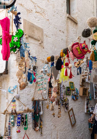 Polignano a Mare, Italy - September 17, 2019: Store display with handmade souvenirs in Polignano a Mare. Apulia, Bari province, Italy,のeditorial素材