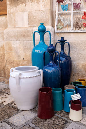 Polignano a Mare, Italy - September 17, 2019: Hand-painted colorful traditional ceramics at a shop display in Polignano a Mare. Puglia. italyのeditorial素材