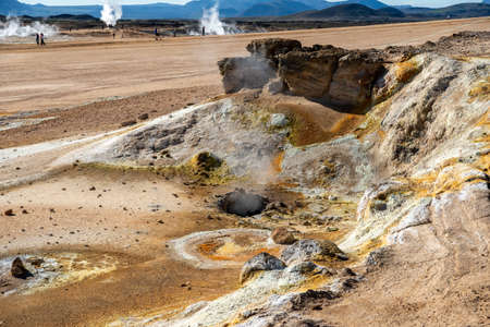 Hverir, Iceland - July 24, 2017: Visitors admiring the steaming volcanic pools at Hverir, Myvatn, Nordhurland Eystra, Iceland.のeditorial素材