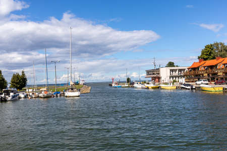 Frombork, Poland - Sept, 7, 2020: Marina and harbor for fishing boats in Frombrok on Vistula Lagoon....
