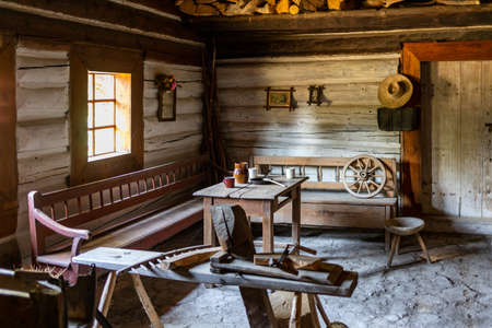 Wygiezlow, Poland - August 14, 2020: Interior of wooden rural cottage from the 19th century in heritage park. Open-air museum Nadwislanski Ethnographic Park in Wygiezlow. Malopolska, Polandのeditorial素材
