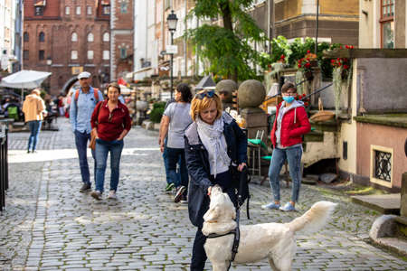 Gdansk, Poland - Sept 6, 2020: Group of people on Mariacka Street, the main shopping street for the amber and jewelry in the old hanseatic city of Gdansk, Poland.のeditorial素材