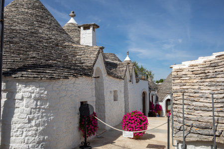 Trulli village in Alberobello, Italy. The style of construction is specific to the Murge area of the Italian region of Apulia (in Italian Puglia). Made of limestone and keystone.の写真素材