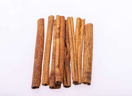 Cinnamon sticks, classic spice from the inner bark of tropical Asian trees, flavorful and aromatic...