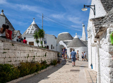 Alberobello, Italy - Septembet 16, 2019: Tradtional white houses in Trulli village. Alberobello, Italy. The style of construction is specific to the Murge area of the Italian region of Apulia (in Italian Puglia). Made of limestone and keystone.のeditorial素材