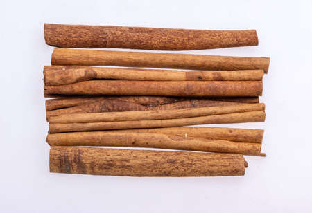 Cinnamon sticks, classic spice from the inner bark of tropical Asian trees, flavorful and aromatic for cooking, baking, health food and medicinal uses.の写真素材