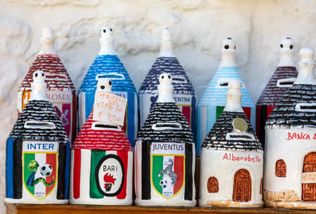 Alberobello, Italy - September 16, 2019: Traditional Apulian souvenirs on display outside a shop in Alberobello. Apulia, Italyのeditorial素材