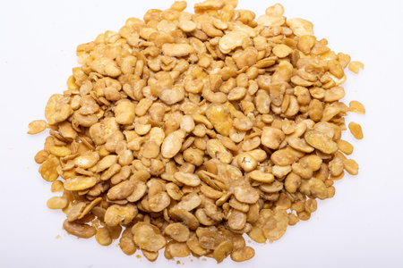 Roasted and salted fava beans for a healthy vegan and vegetarian diet snack. High in protein,...