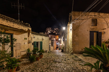 Matera, Italy - September 19, 2019: Cobblestone street in the Sassi di Matera a historic district in the city of Matera. Basilicata. Italyのeditorial素材
