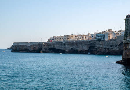 View of Polignano a mare - picturesque little town on cliffs of the Adriatic Sea. Apulia, Southern Italyのeditorial素材