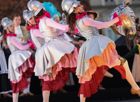 Krakow, Poland - July 25, 2021: Artists in costumes performing on stage during a show of court dances at the Main Market Square as part of the 22nd Cracovia Danza Court Dance Festivalのeditorial素材