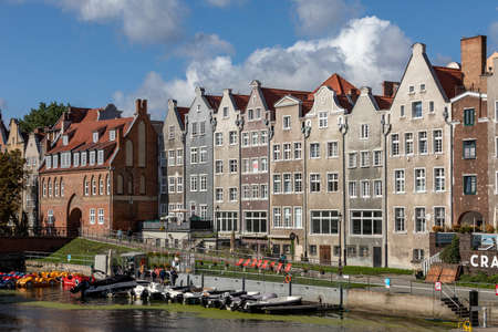 Gdansk, Poland - Sept 6, 2020: Gdansk, Old Town - historic tenement houses with gables along Motlawa...