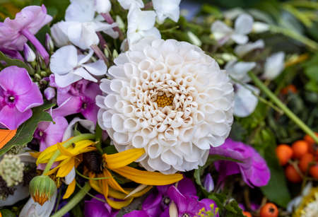 Traditional bouquet of flowers, herbs and fruits that are the symbol of summerの写真素材