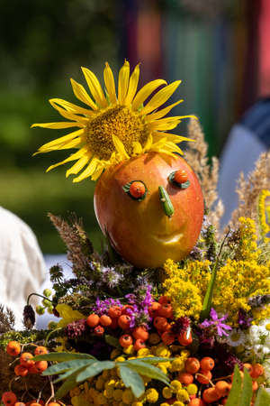 Traditional bouquet of flowers, herbs and fruits that are the symbol of summerの写真素材