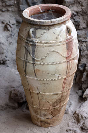 Santorini, Greece - July 01, 2021: Recovered ancient pottery in prehistoric town of Akrotiri, excavation site of a Minoan Bronze Age settlement on the Greek island of Santoriniのeditorial素材