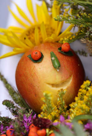 Traditional bouquet of flowers, herbs and fruits that are the symbol of summerの写真素材