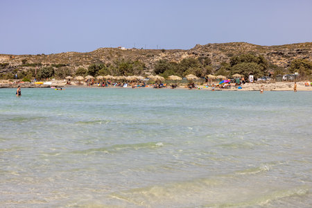 Elafonisi, Crete, Greece - Sept 19, 2021: People relaxing on the famous pink coral beach of Elafonisi on Crete, Mediterannean sea, Greeceのeditorial素材