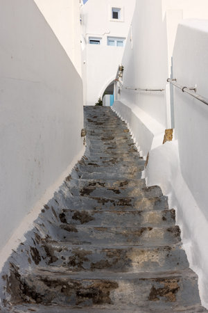 Narrow stone steps, a traditional piece of architecture on the island of Santorini. Greeceの写真素材