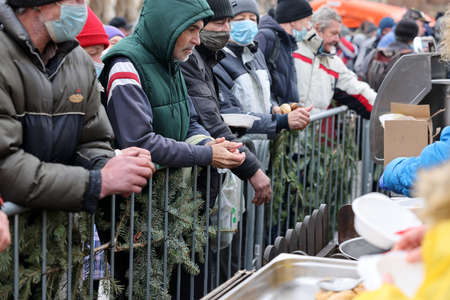Krakow, Poland - Dec 19, 2021: Christmas Eve for poor and homeless on the Main Square in Cracow....
