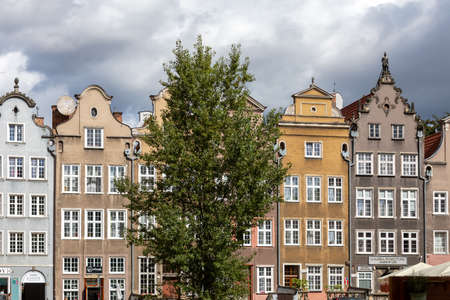 Gdansk, Poland - Sept 6, 2020: Colorful facades of historic tenement houses in old town in Gdansk