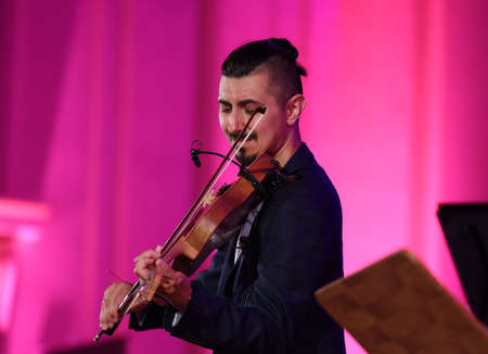 Cracow, Poland - July 4, 2022: Adam Baldych Quartet and Paolo Fresu live on stage of Krakow Philharmonic at Summer Jazz Festival in Cracow, Polandのeditorial素材
