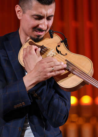 Cracow, Poland - July 4, 2022: Adam Baldych Quartet and Paolo Fresu live on stage of Krakow Philharmonic at Summer Jazz Festival in Cracow, Polandのeditorial素材