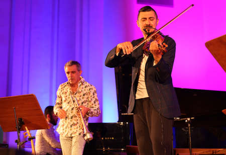 Cracow, Poland - July 4, 2022: Adam Baldych Quartet and Paolo Fresu live on stage of Krakow Philharmonic at Summer Jazz Festival in Cracow, Polandのeditorial素材