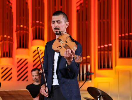 Cracow, Poland - July 4, 2022: Adam Baldych Quartet and Paolo Fresu live on stage of Krakow Philharmonic at Summer Jazz Festival in Cracow, Polandのeditorial素材