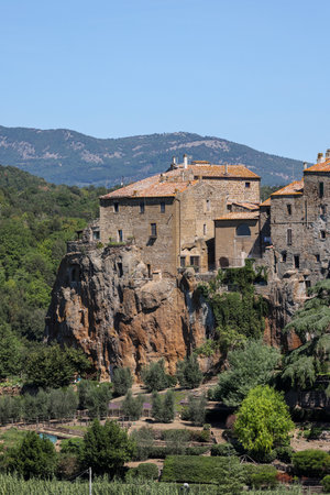 Pitigliano - the picturesque medieval town founded in Etruscan time on the tuff hill in Tuscany,...