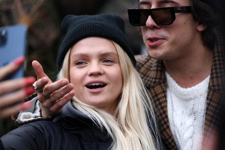 Krakow, Poland - Dec 19, 2021: Margaret and Dawid Kwiatkowski during the distribution of Christmas trees at Szczepanski Square in Krakowのeditorial素材
