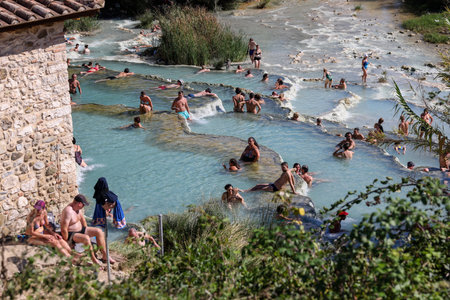 Saturnia, Italy - September 13, 2022: People are bathing in the hot springs of Saturnia Therme, Saturnia, Tuscany, Italyのeditorial素材
