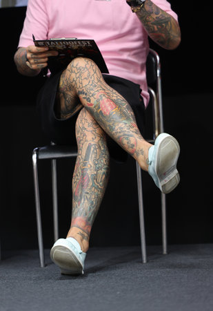 Krakow, Poland - June 11, 2022: Unidentified participant at 15th Tattoofest Convention in Cracow. One of the most prestigious tattoo festivals.のeditorial素材