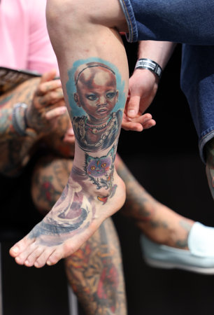 Krakow, Poland - June 11, 2022: Unidentified participant at 15th Tattoofest Convention in Cracow. One of the most prestigious tattoo festivals.のeditorial素材