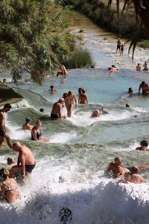 Saturnia, Italy - September 13, 2022: People are bathing in the hot springs of Saturnia Therme, Saturnia, Tuscany, Italyのeditorial素材